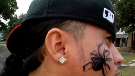 spider face tattoo